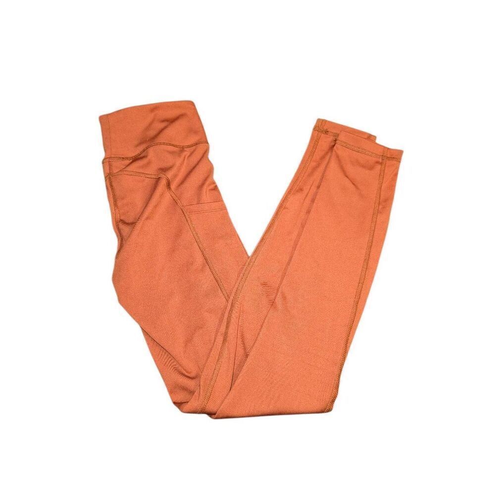Athleta Women's XS-TP Orange Salutation Stash Pocket II Tight Legging